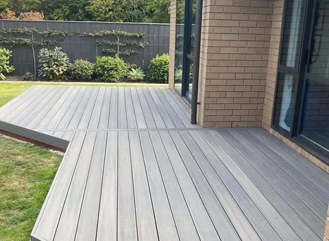 L-shaped composite deck outside a brick home, Palmerston North