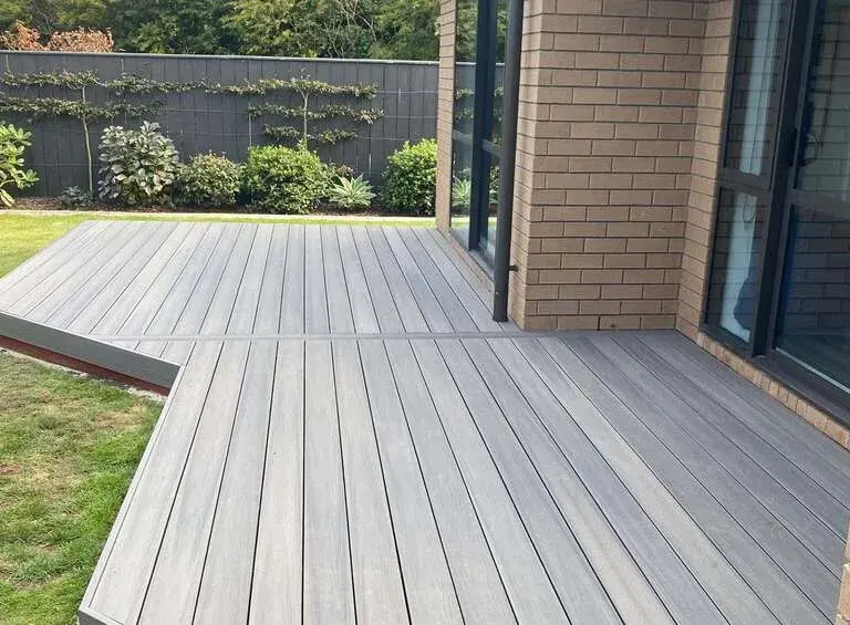 L-shaped composite deck outside a brick home, Palmerston North